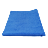 Folded blue microfibre towel on a white background