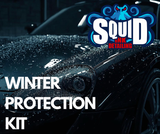 Car with winter protection kit labeled 'Squid Ink Detailing' on a dark background